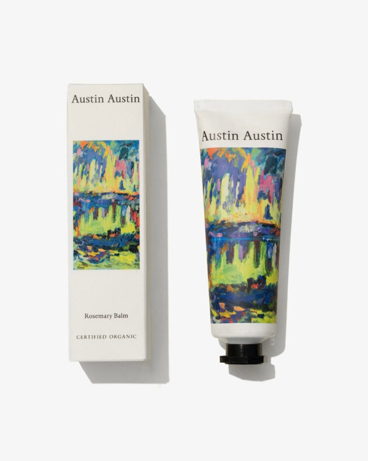 Austin Austin balm tube and packaging with colorful design on a white background
